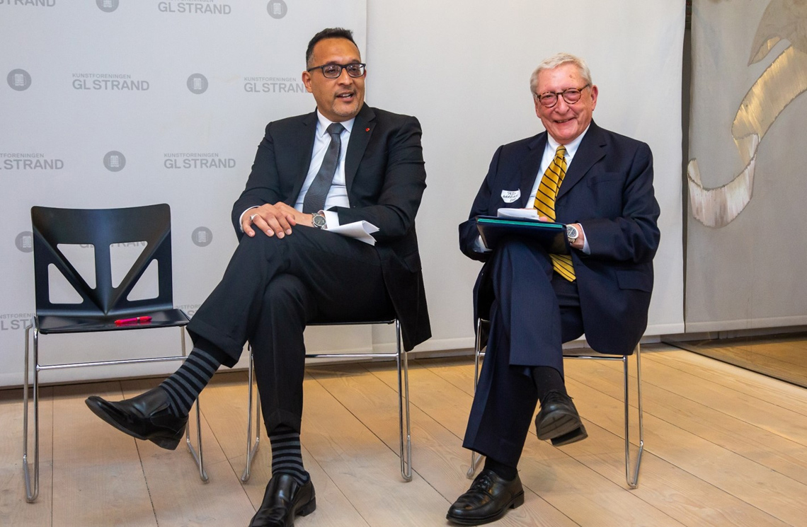 Jay Khosla and Ted Garrish seated on stage at CEM9