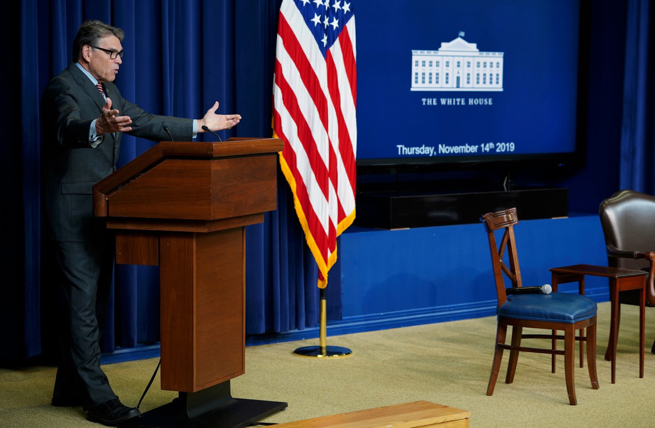U.S. Secretary of Energy Rick Perry standing at podium
